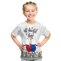 White crewneck T-shirt with “All Saints Day” front print and red/blue praying hands