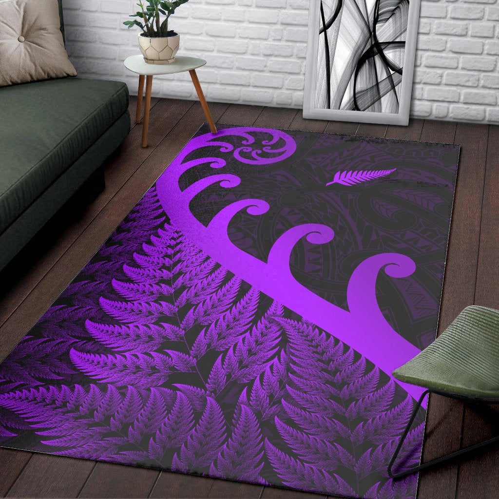 Purple koru-and-fern area rug with swirling motifs on dark base
