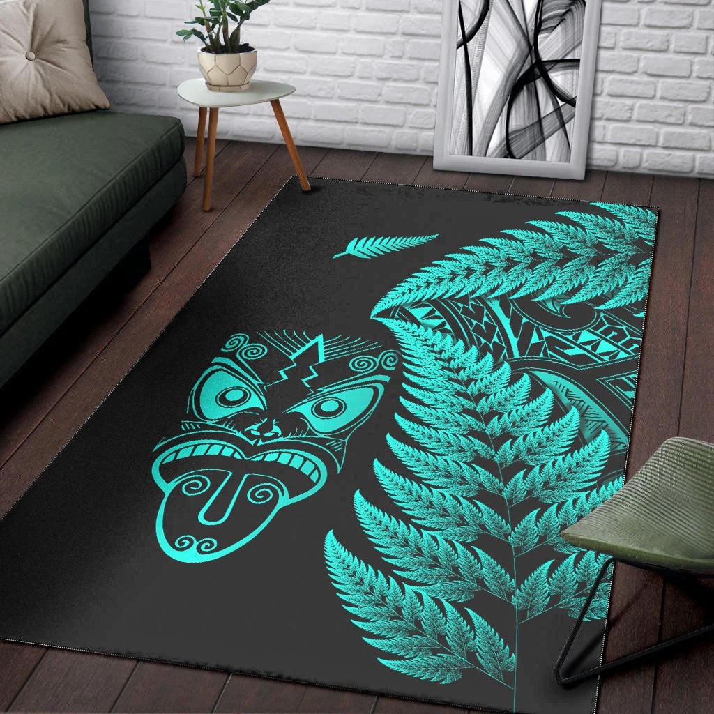Black area rug with turquoise fern branches and Maori mask artwork