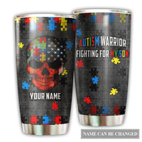 Personalized tumbler with black puzzle pattern, red skull graphic, and name text