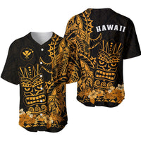 Black and gold Hawaiian baseball jersey with tiki mask graphic and floral hem