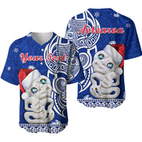 Blue baseball jersey with Hei Tiki-style graphic, Santa hat and festival pattern