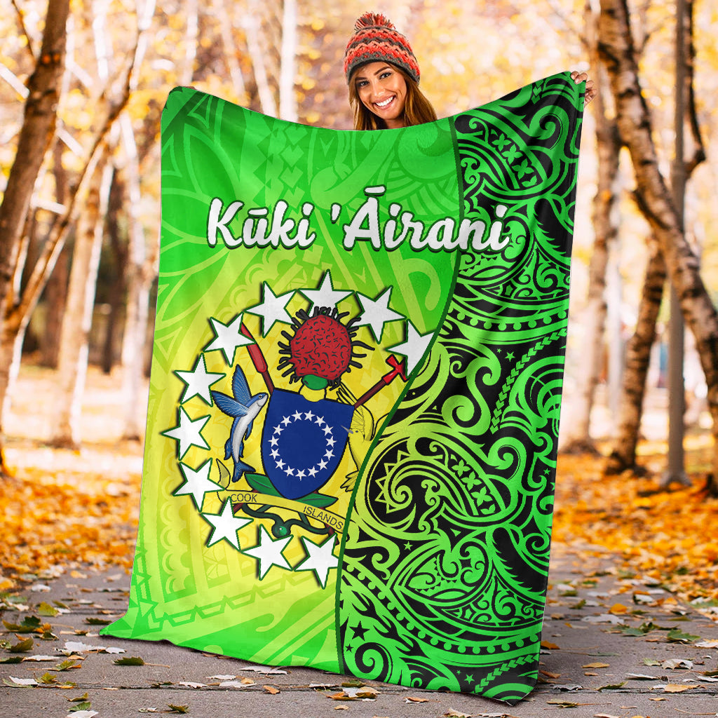 Green Polynesian turtle blanket with Cook Islands crest and swirl details