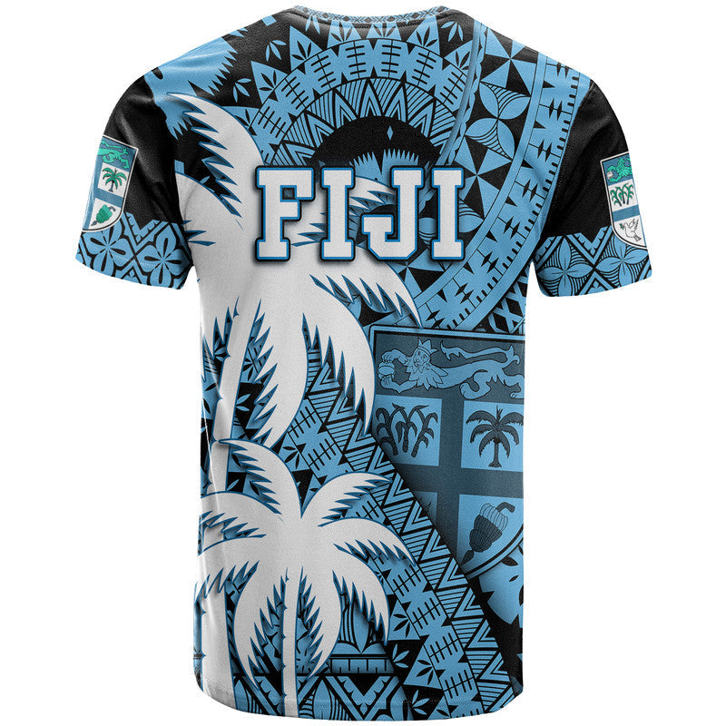 Blue graphic T-shirt with FIJI text and palm tree/tribal motifs, short sleeves