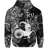 Black pullover hoodie with large Capricorn motif in Polynesian pattern, full-sleeve print