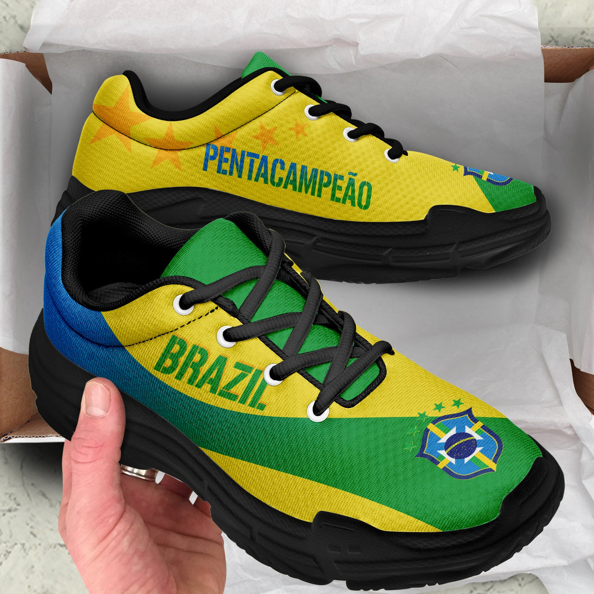 Brazil-themed chunky sneakers, yellow upper with green/blue accents and black sole
