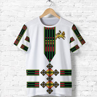 White T-shirt with green, red, and black Ethiopian flag-style print on the front