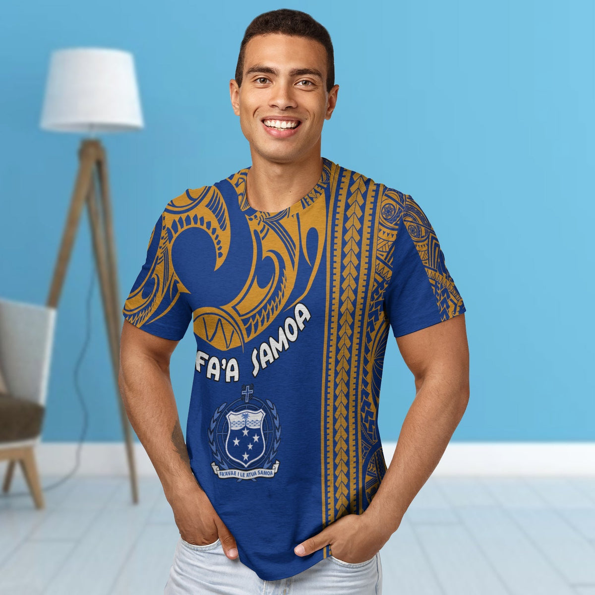 Blue “Faa Samoa” T-shirt worn by model, yellow tribal-style side stripe and crest graphic