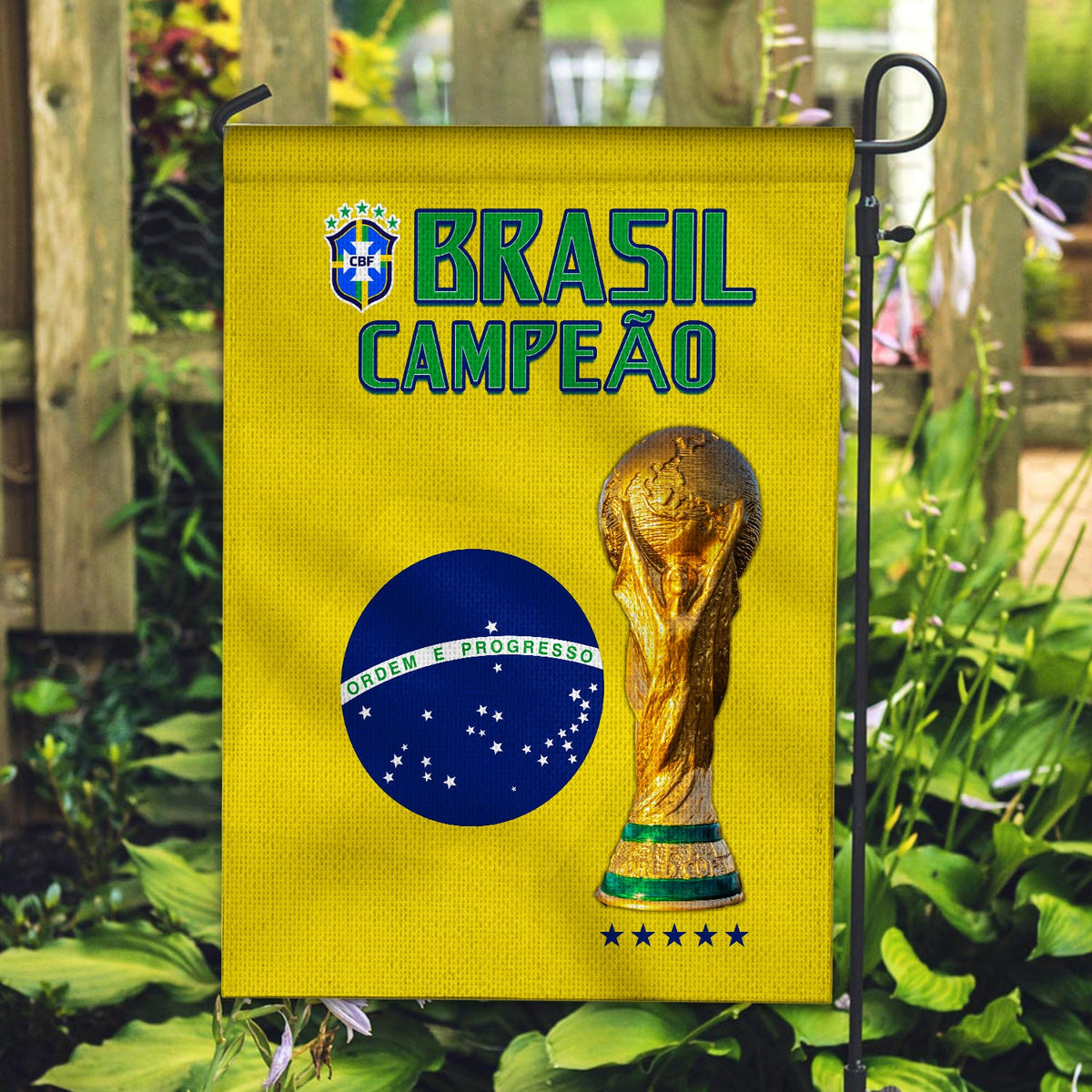 Yellow Brazil house flag showing BRASIL CAMPEAO, Brazil map, trophy and stars