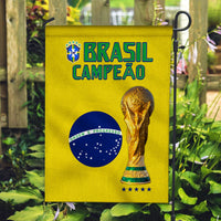 Yellow Brazil house flag showing BRASIL CAMPEAO, Brazil map, trophy and stars