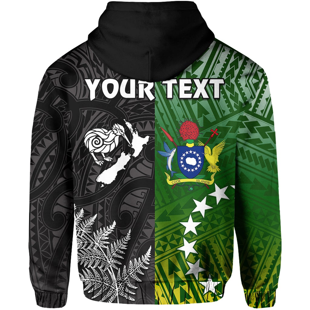 Black hoodie close-up: 'YOUR TEXT' over Maori pattern with crest and fern imagery.