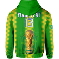 Green football hoodie back: 'YOUR TEXT 13' with gold trophy graphic and hood.