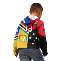 Kids zip hoodie back view with black star pattern, yellow-green badge and striped hood