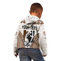 Kids zip hoodie, white back print with YOUR TEXT and tapa shield emblem