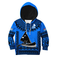 Blue kids rugby hoodie with hood, bold black triangular emblem, patterned bands, drawstring