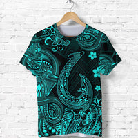 Turquoise Hawaiian fish hook Polynesian T-shirt, black base with floral and tribal patterns