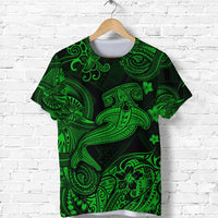 Green short-sleeve T-shirt with Polynesian-style hammer shark and floral pattern