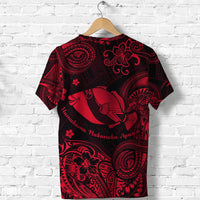 Back view red Polynesian T-shirt with patterned swirls, fish art, and script text