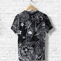 Black crewneck T-shirt with Polynesian surf pattern, surfboard, flowers, “Surfing”