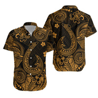 Black button-up Hawaiian shirt with gold floral and swirl print, short sleeves