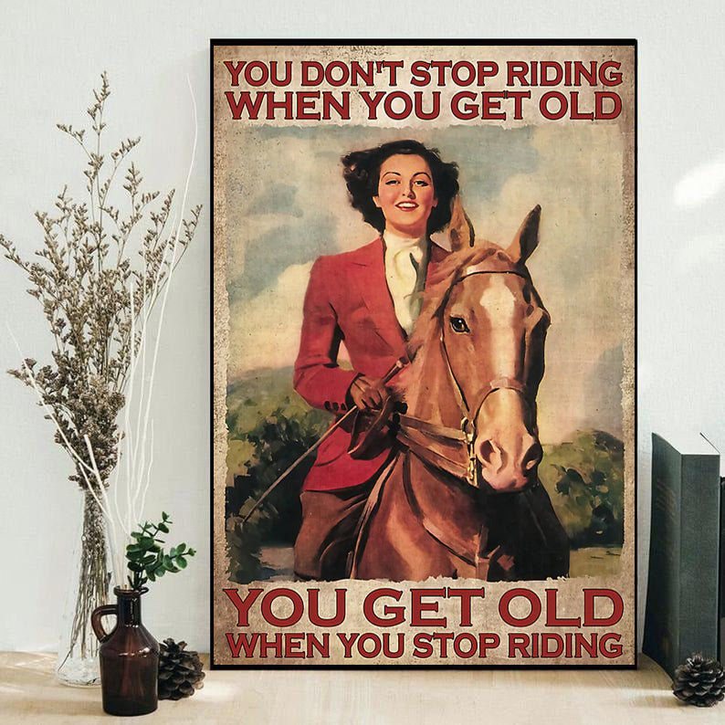 Framed vertical horse-riding poster: rider with tan horse, text "YOU DON'T STOP RIDING".