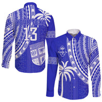 Blue long sleeve rugby button shirt with white Polynesian tapa pattern and custom text