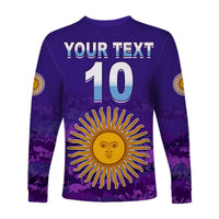 Purple long-sleeve football shirt with number 10, custom text, and sun face design