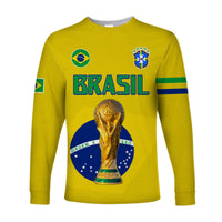 Brazil yellow long sleeve football shirt with BRASIL lettering, trophy graphic and crest