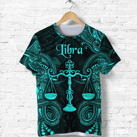 Turquoise Libra zodiac Polynesian T-shirt with scales and teal tribal pattern, front