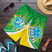 Green football shorts with yellow panels, white stripes, and custom text/number graphic