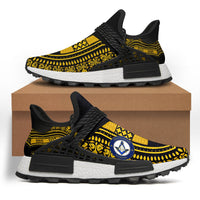 Black sneakers with yellow masonic dashiki pattern and black sole