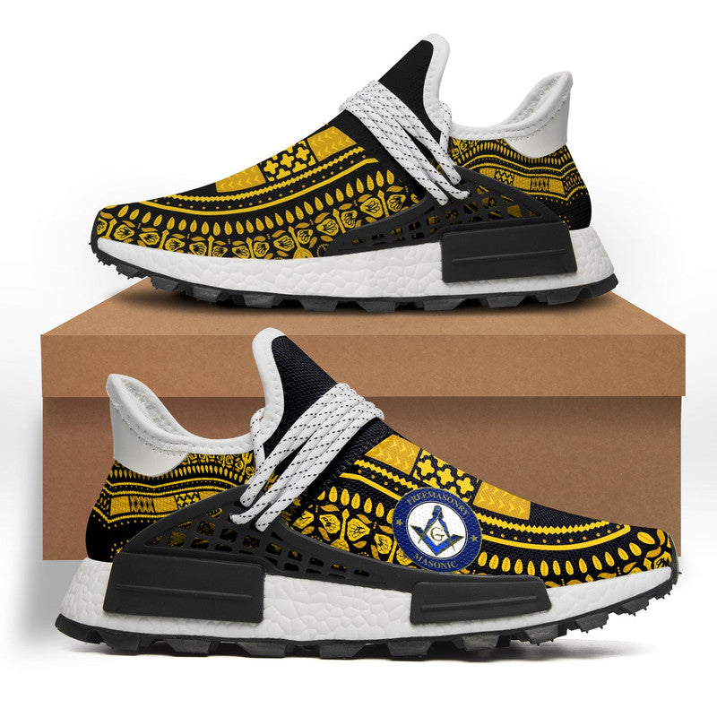 White sneakers with yellow masonic dashiki pattern, black sole and laces