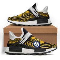 White sneakers with yellow masonic dashiki pattern, black sole and laces