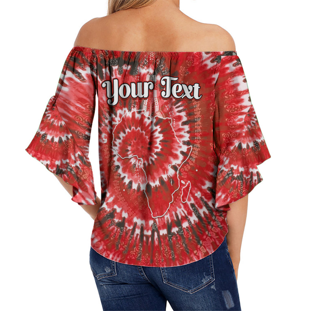 Red tie-dye off-shoulder top with flared sleeves, patterned back and printed text