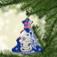Blue Christmas tree-shaped ceramic ornament with Hei Tiki and “Meri Kirihimete” text