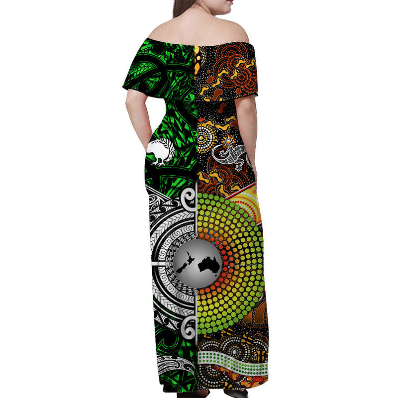 Green off-shoulder long dress, tribal artwork and dot pattern on back view