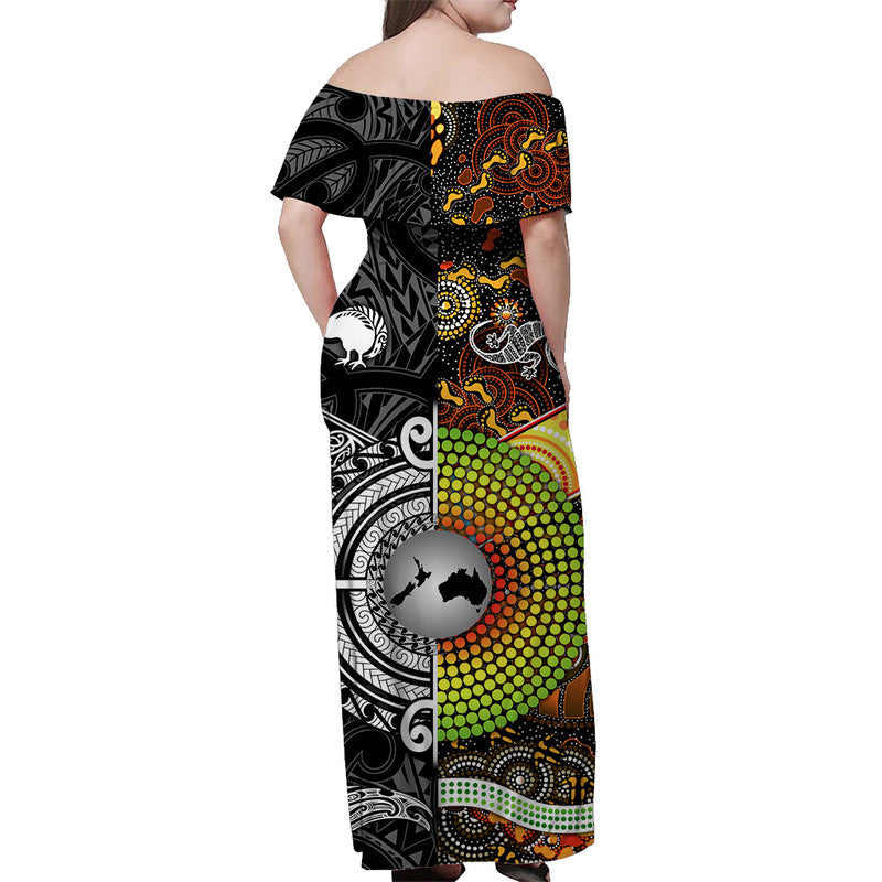 Black off-shoulder maxi dress, side view with colorful tribal patterns and dot accents