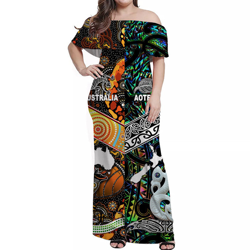 Off-shoulder maxi dress in black with colorful Polynesian-style motifs and Australia text