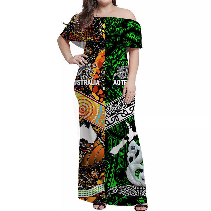 Green off-shoulder long dress with bold tribal print and Australia/Aotearoa lettering
