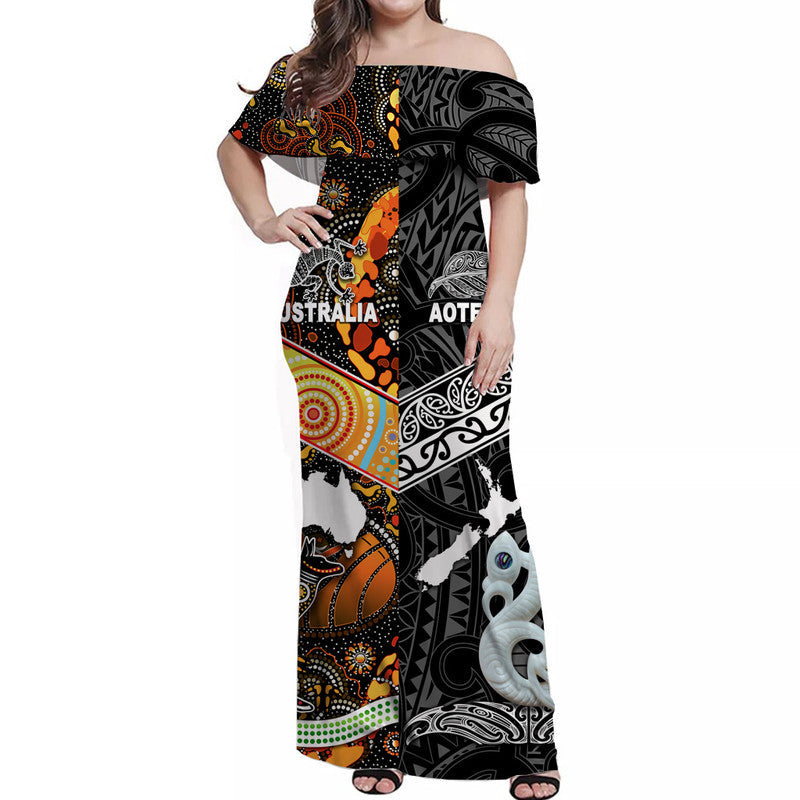 Black off-shoulder maxi dress with colorful tribal graphics and AUSTRALIA/AOTEAROA text