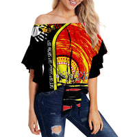 Women’s off-shoulder wrap top, black with red/yellow Aboriginal-style print