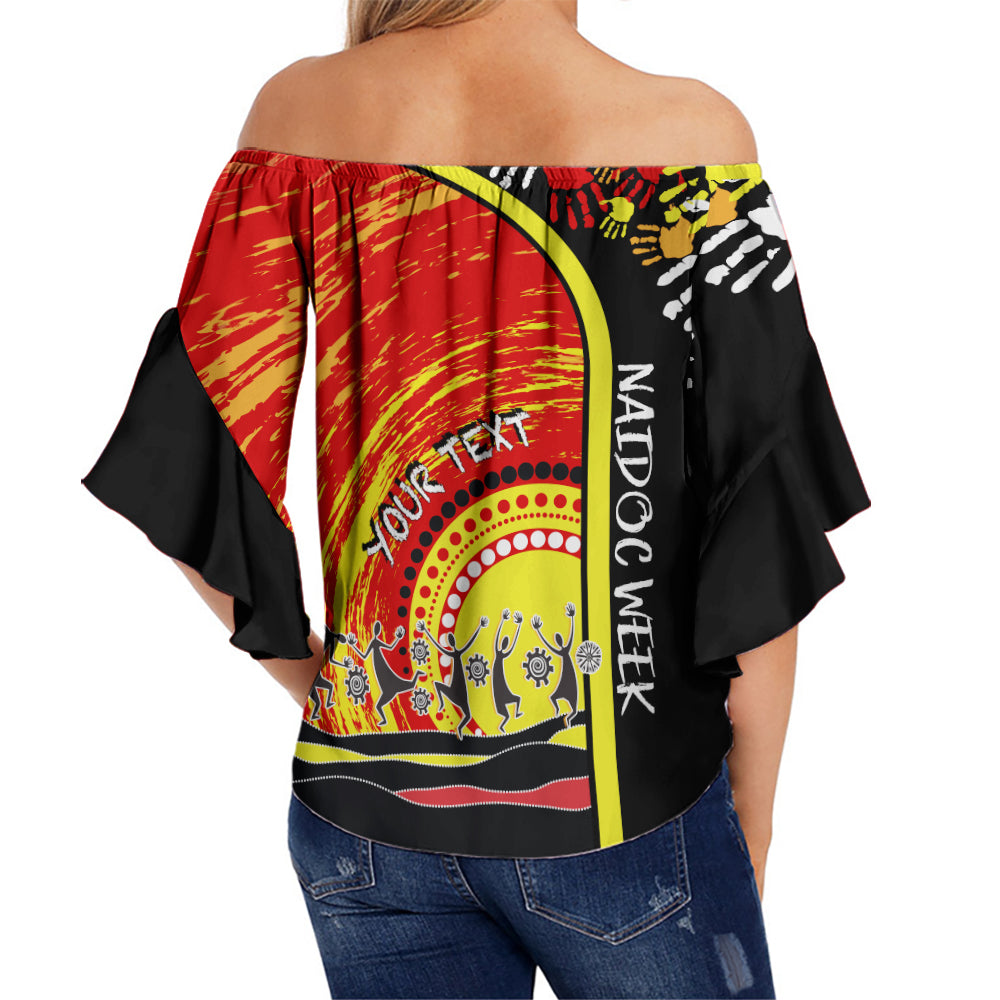 Women’s off-shoulder wrap top, black and red/yellow with large back graphic text