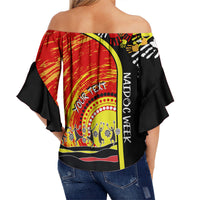 Women’s off-shoulder wrap top, black and red/yellow with large back graphic text
