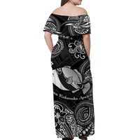 Black off-shoulder maxi dress back view with fish and tribal swirl print