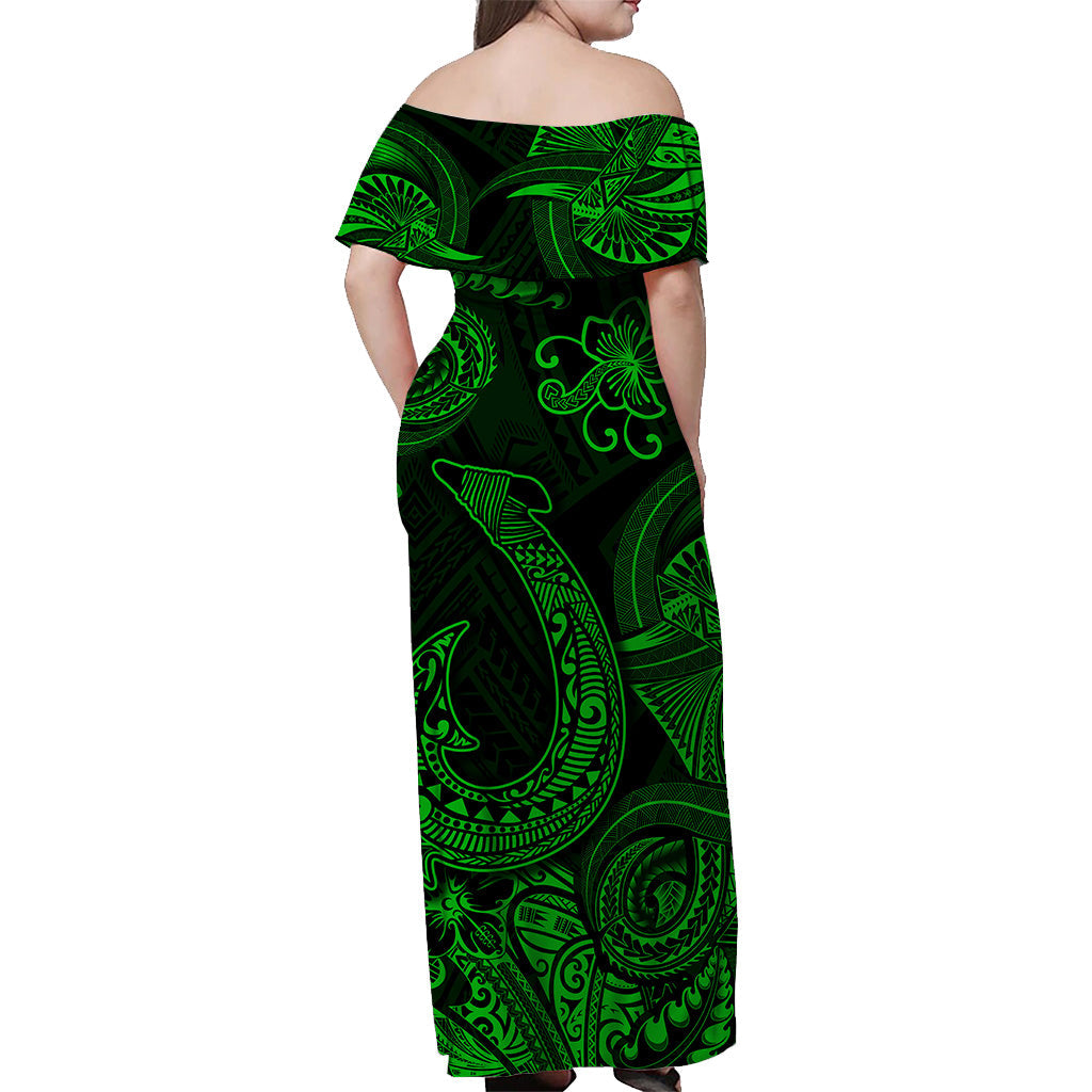 Back view off-shoulder maxi Hawaiian dress, dark green with neon tribal fish and leaf motifs