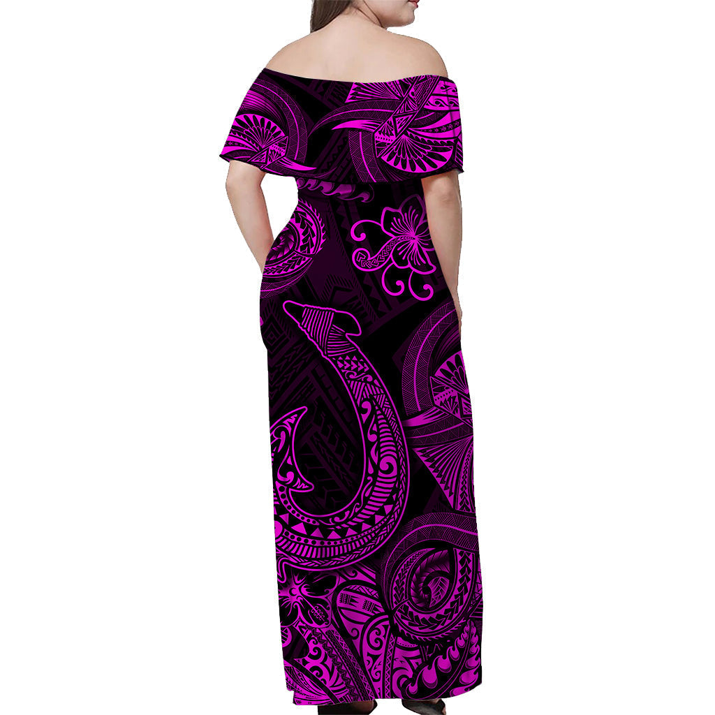 Back view of long off-shoulder maxi dress, black with purple-magenta patterned accents
