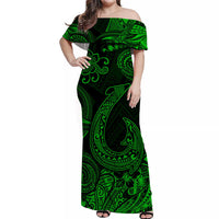 Off-shoulder maxi Hawaiian dress in dark green with neon tribal fish and floral swirl