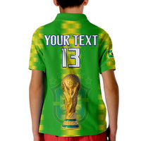 Kids green football polo with yellow grid, back YOUR TEXT 13 and gold trophy graphic