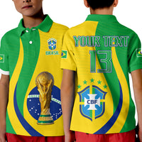 Kids polo shirt in green and yellow with collar, trophy graphic, and Brasil crest