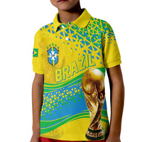 Kids yellow Brazil polo shirt with green/blue pattern, crest and trophy graphic